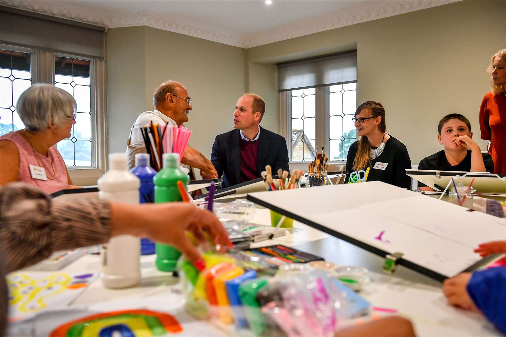 William with former firefighter Richard Baldwin in an art therapy session during a visit to The Fire Fighters Charity’s Harcombe House centre in Chudleigh, Devon (Ben Birchall/PA)