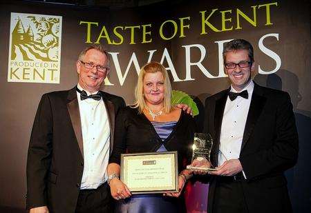 John Warnett with Amy Lloyd of The Plough at Stalisfield Green, the Kent Dining Pub of the Year, and Stephen Clarke of Kent Frozen Foods