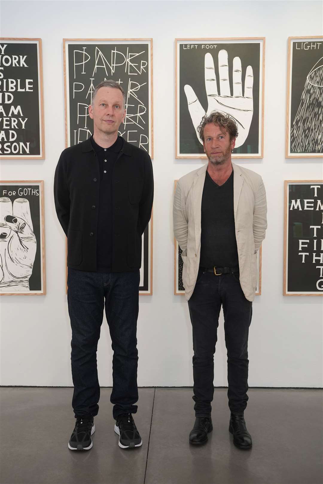 David Shrigley (left) and Michael Schafer at the Jealous Gallery in Shoreditch, London (Lucy North/PA)