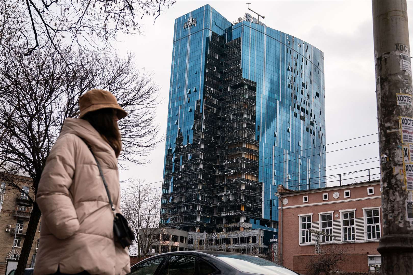 The part-destroyed business tower in central Kyiv (Aaron Chown/PA)