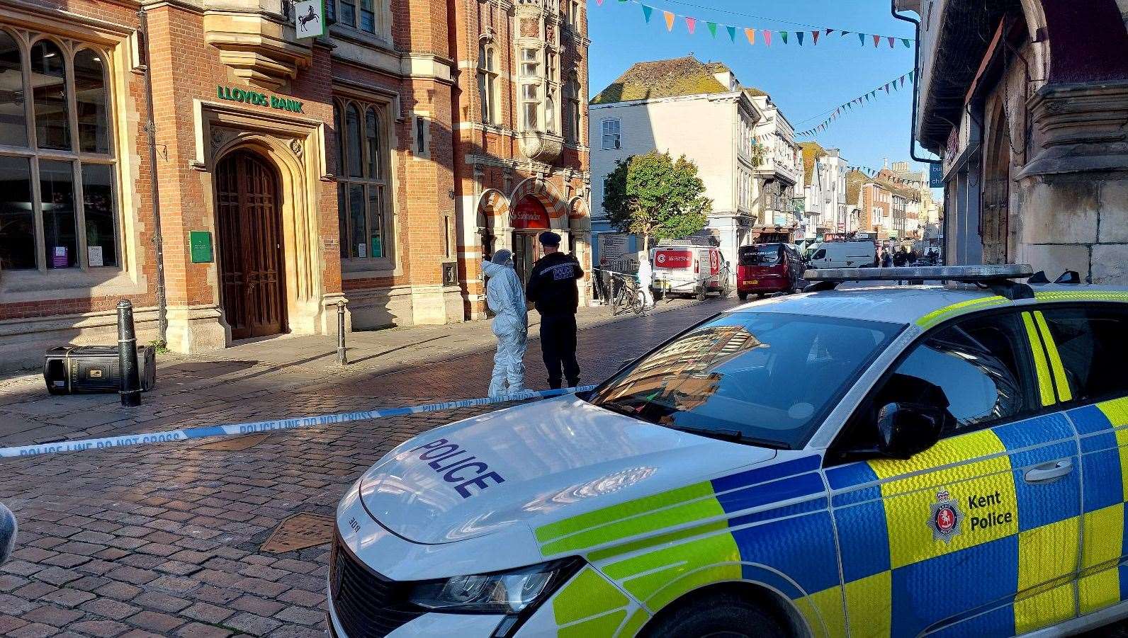 A police cordon remains in place after a man was stabbed to death in Canterbury High Street