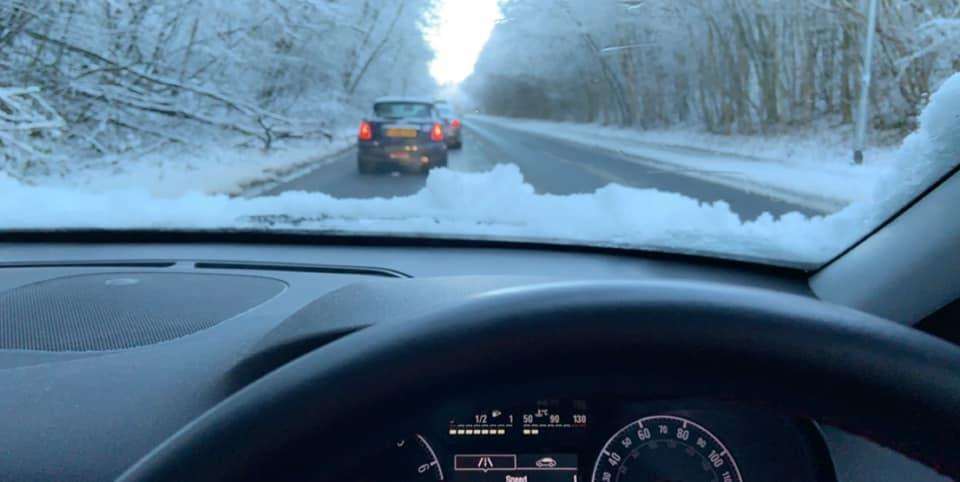 Michelle driving through Walderslade woods in the snow