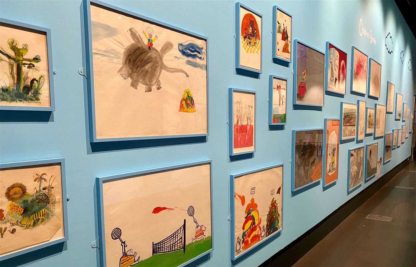 The wall of children’s illustrations takes you through 60 years of artwork. Picture: Sam Lawrie