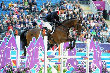 William Fox-Pitt, from Canterbury, competes on Lionheart during the Team Eventing Jumping Final on day four of the London Olympic Games at Greenwich Park. Picture: Owen Humphreys/PA Wire