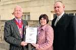 KCC chairman Peter Lake accepts the Kennington petition from Debbie Irwin and Lee Clark