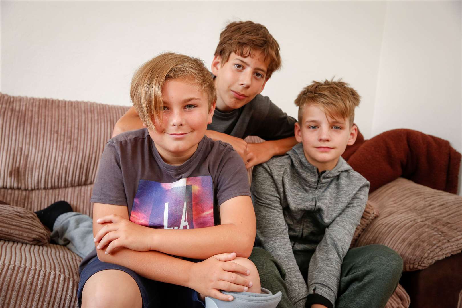 Cameron Hobday, 12, who fell 30ft down a hole on his bike at Brompton Barracks with friends James Driver, 14, and Liam McLaughlin, 12, who helped raise the alarm. Picture: Matthew Walker