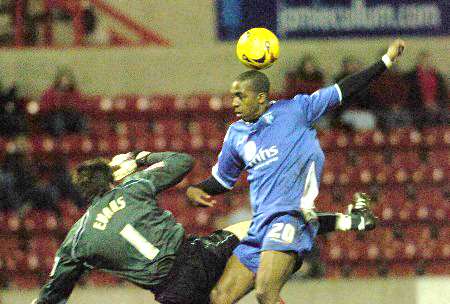 Darren Byfield was dismissed for this challenge on Rhys Evans. Picture: BARRY GOODWIN