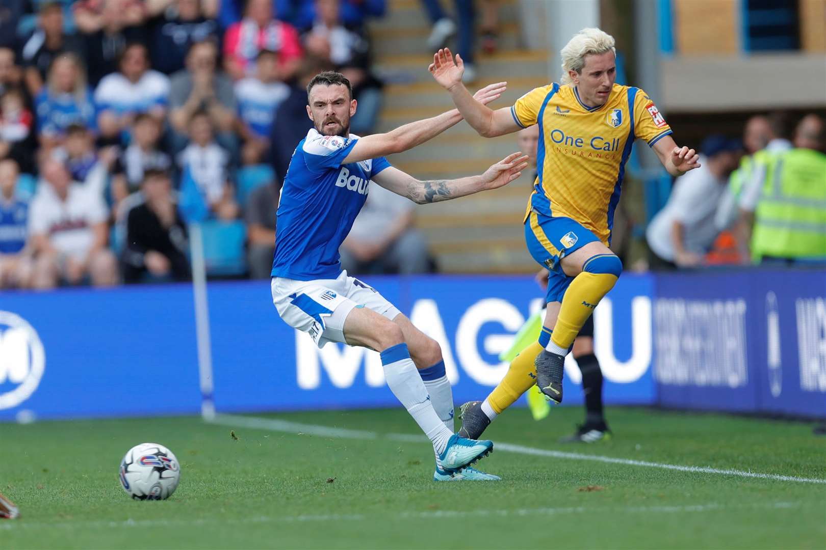 Scott Malone makes a challenge as the Gills take on Mansfield Picture: @Julian_KPI