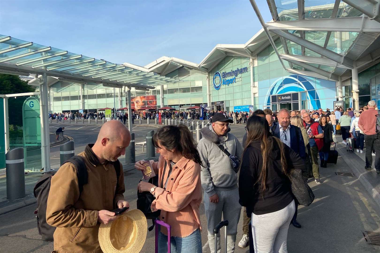 Airline passengers forced to wait outside airport for hours