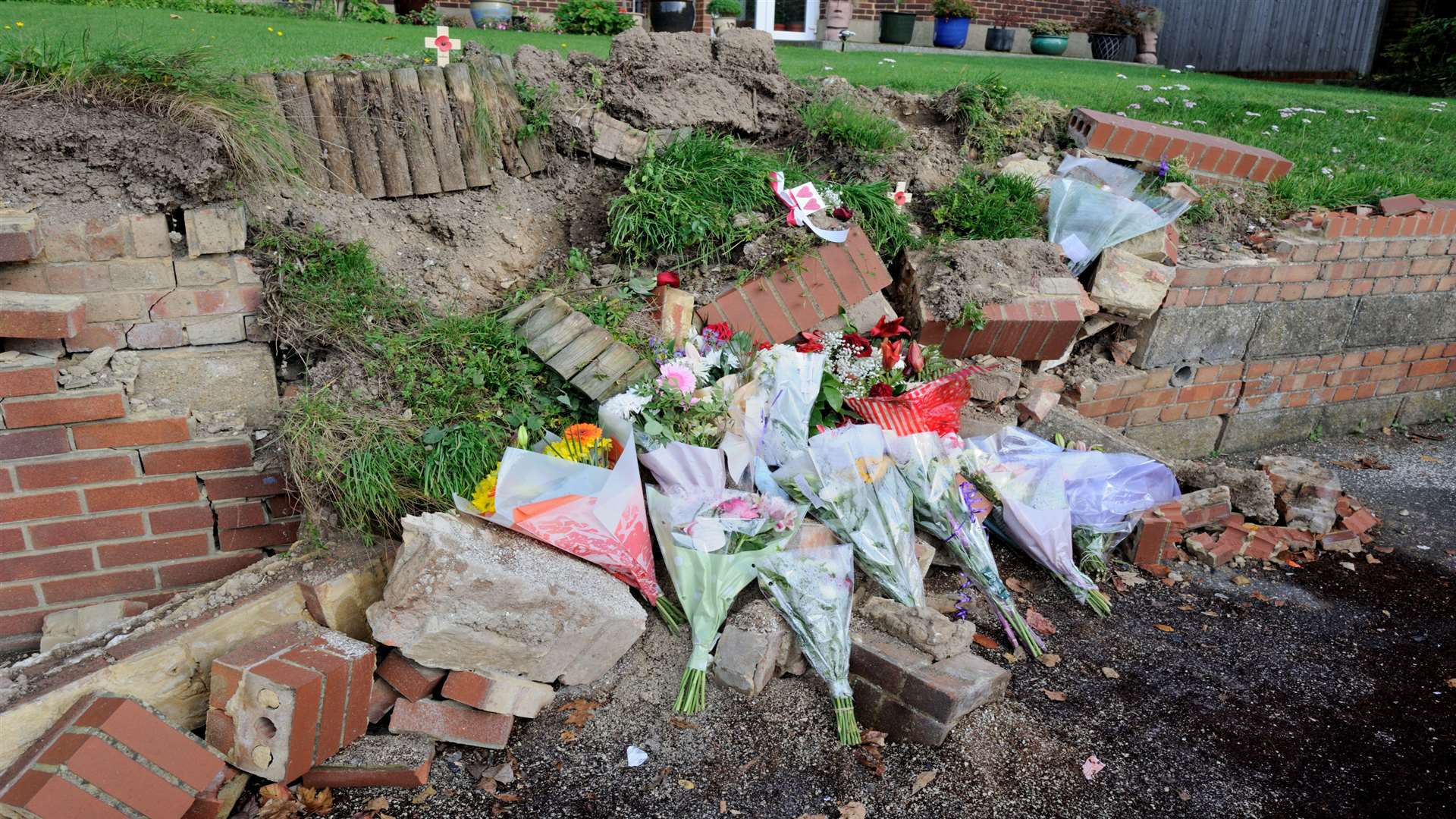 Scene of car crash, Longfield, B260 Main Road opposite Hartley Road. Floral tributes at the scene.