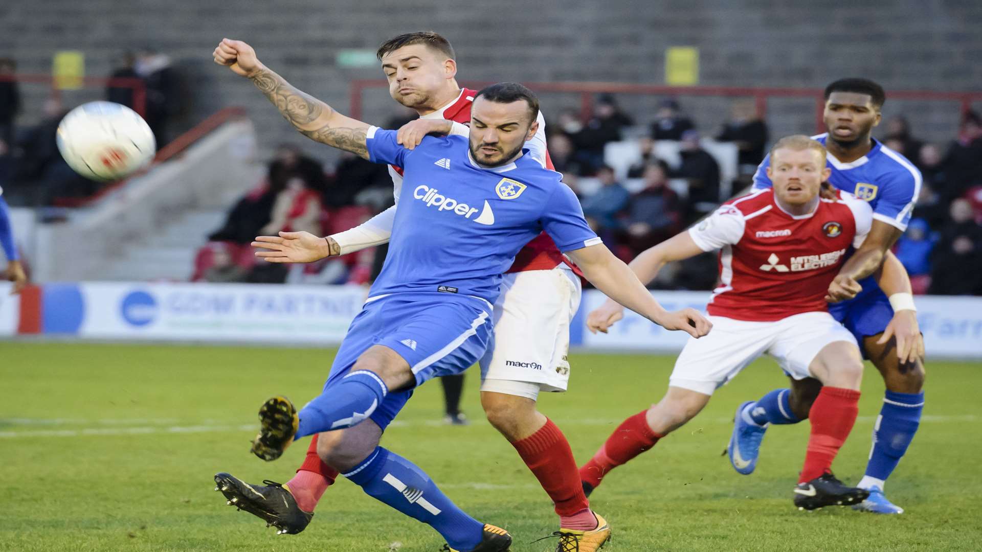 Sam Magri gets stuck into the Guiseley defence Picture: Andy Payton