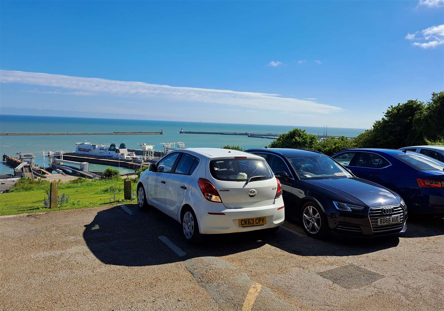 The bottom level of the National Trust White Cliffs car park at Langdon with a view of Dover Eastern Docks