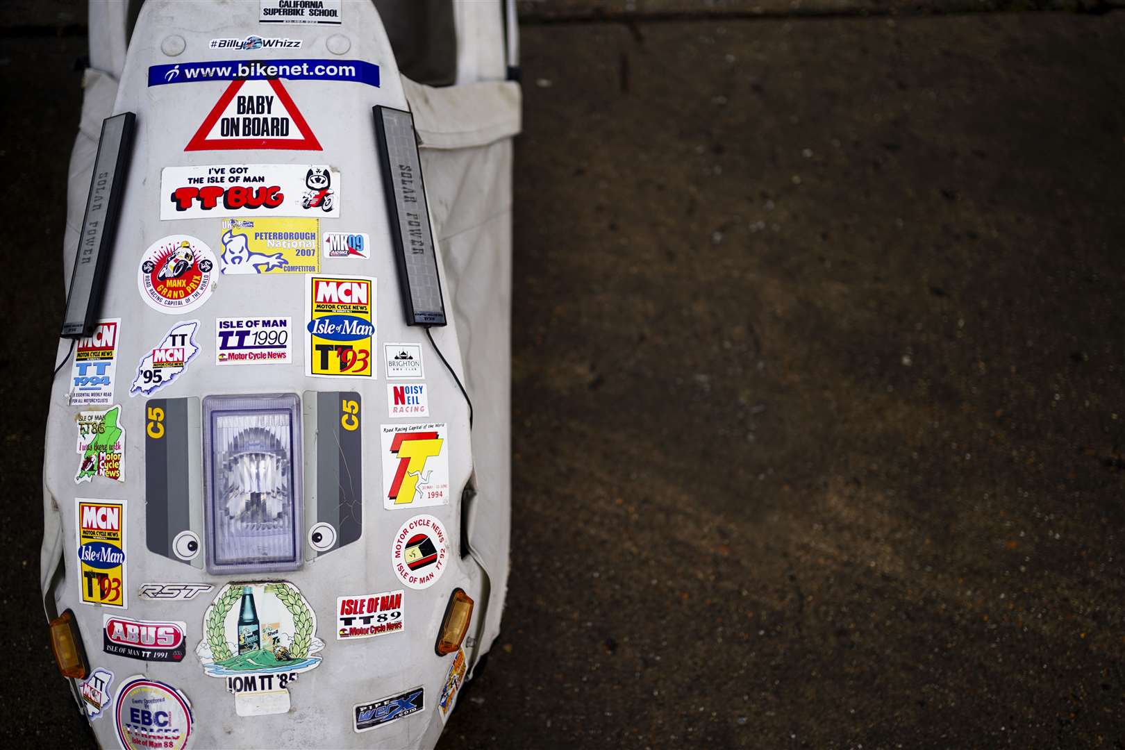 A Sinclair C5 decorated with a myriad of stickers (Jordan Pettitt/PA)