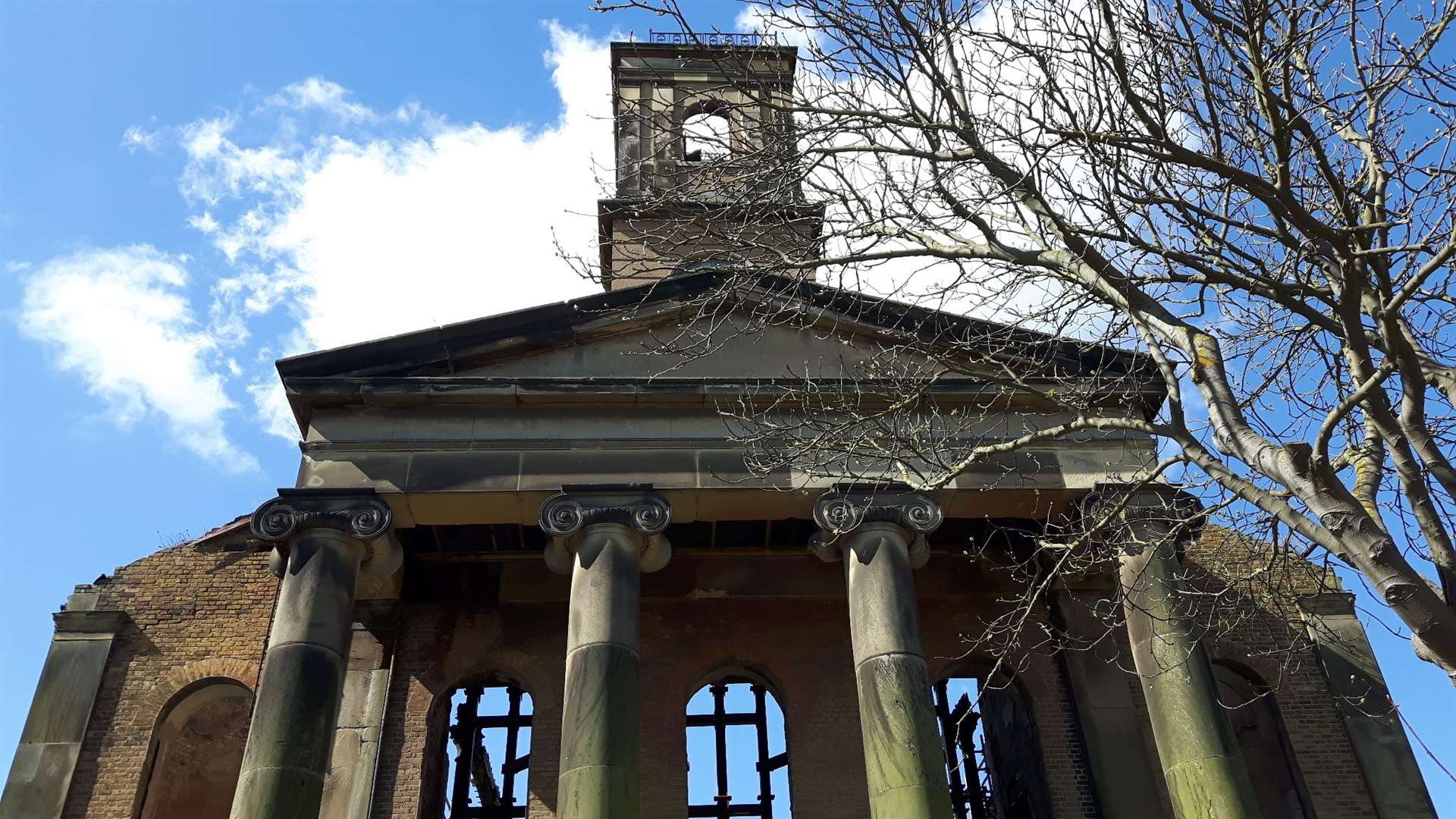 The front of the fire-damaged Dockyard Church at Sheerness before the scaffolding