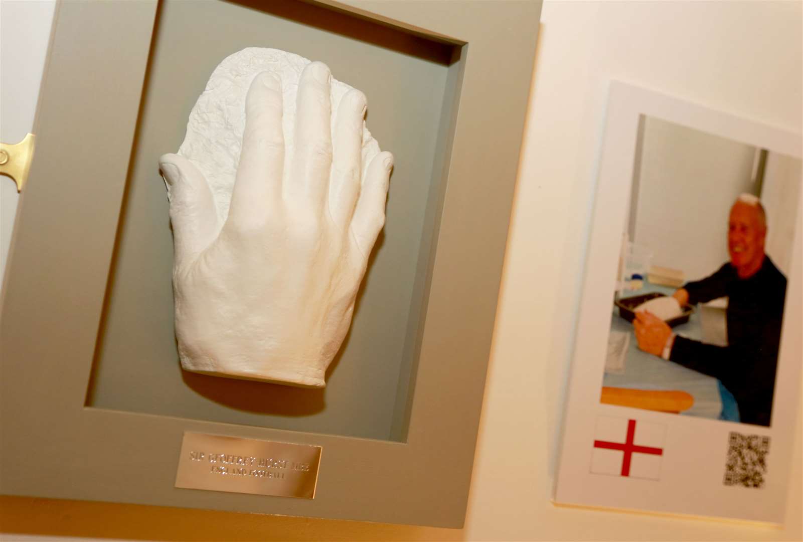 Footballing icon Sir Geoff Hurst was among those who lent a "helping hand" to the exhibition at Rochester Cathedral