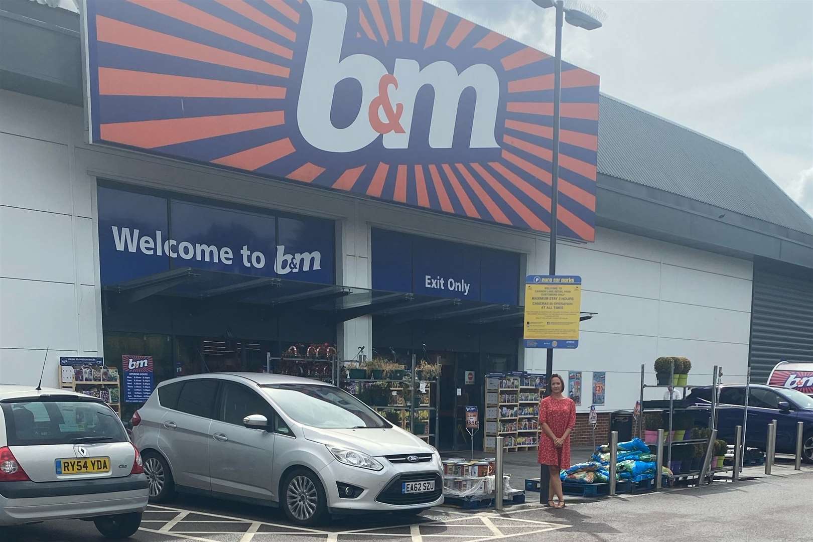 Emma Izzard outside the Tonbridge branch of B&M which refused to serve her