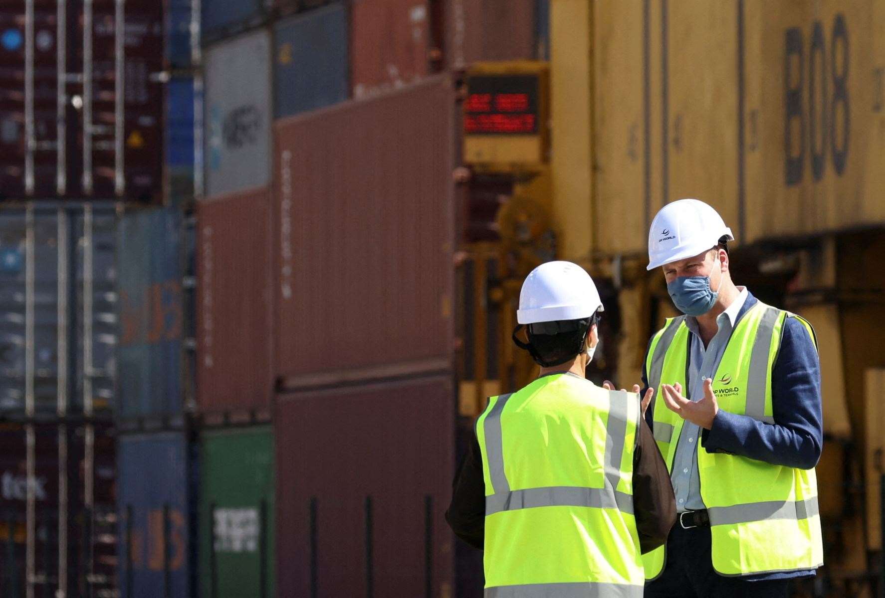 The duke speaks to DP World chairman Sultan Ahmed bin Sulayem during his visit to Jebel Ali Port (Henry Nicholls/PA)