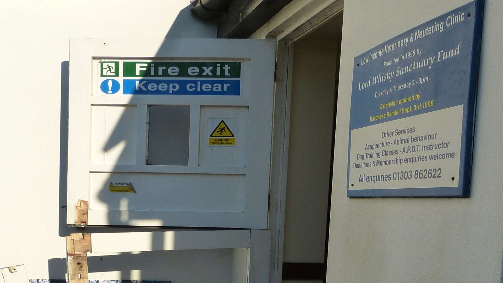 The damaged door at the Lord Whisky veterinary clinic