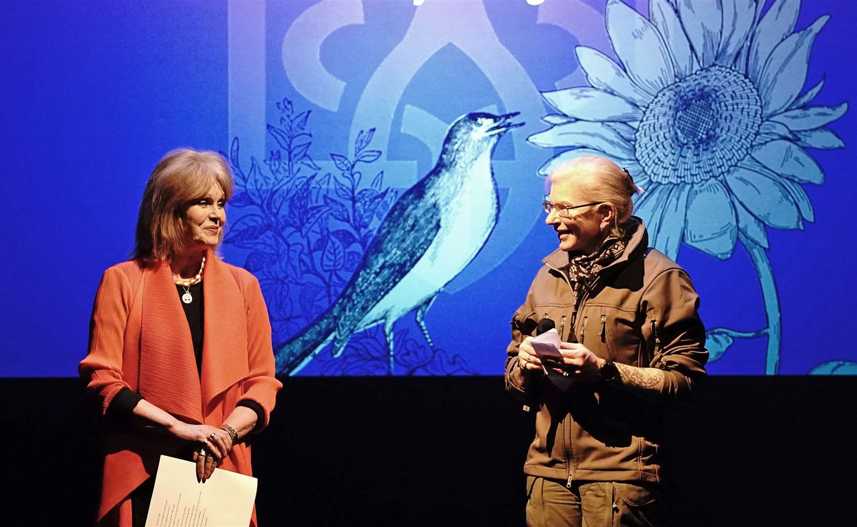 Dame Joanna Lumley and Ukrainian medic Yuliia Paievska read a poem during the United With Ukraine show, an event for the Ukrainian refugee community in London, to mark two years since the Russian invasion, at the Palace Theatre in London (Aaron Chown/PA)