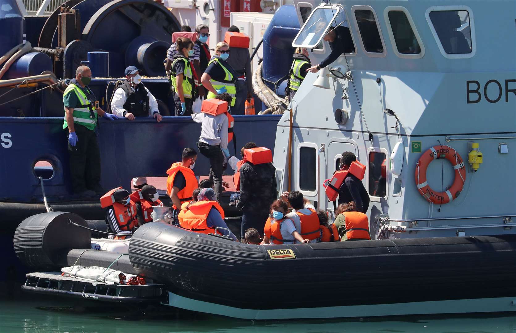 A Border Force vessel brings a group of people thought to be migrants into Dover (Gareth Fuller/PA)