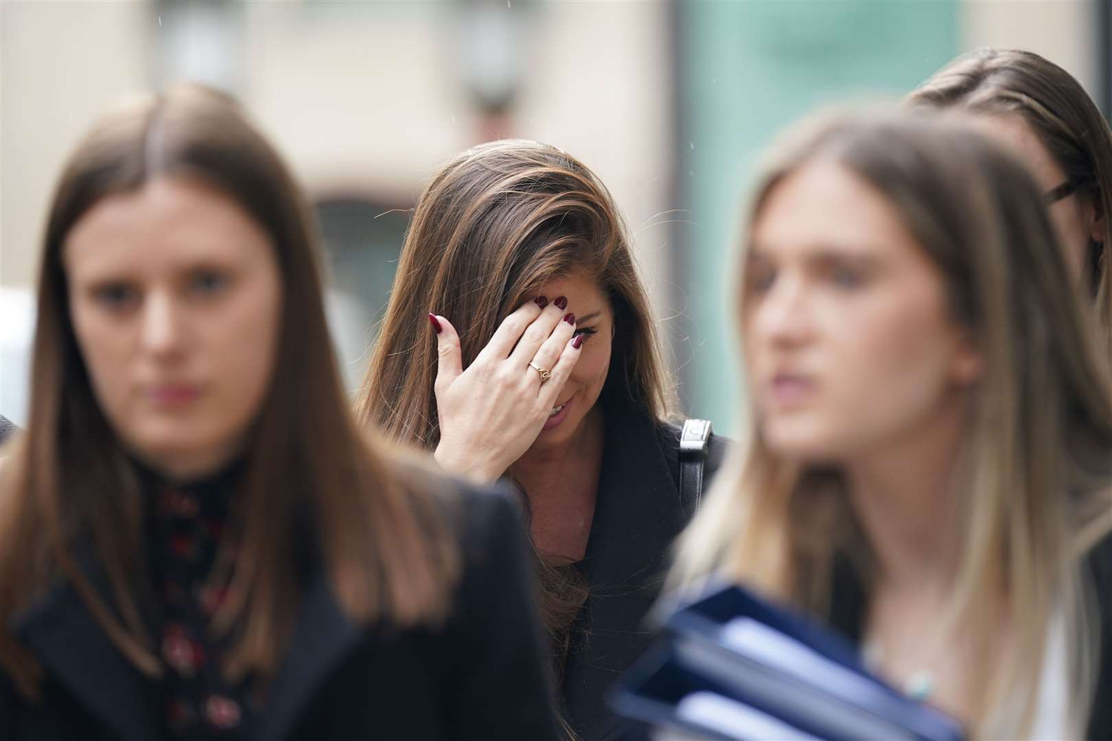 Actress Nikki Sanderson leaving the Rolls Building in central London, following a hearing in the case (PA)