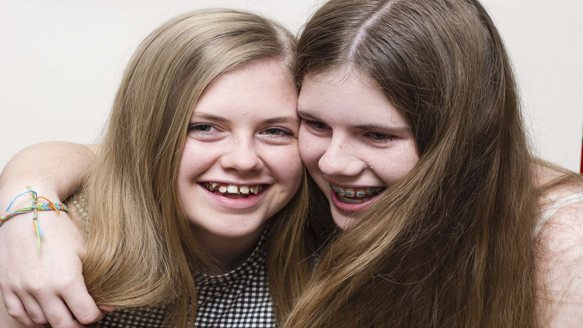 Charlotte Lawrence, 13, is supporting her twin Abbie Lawrence who is having 10" cut from her hair for the Little Princess Trust