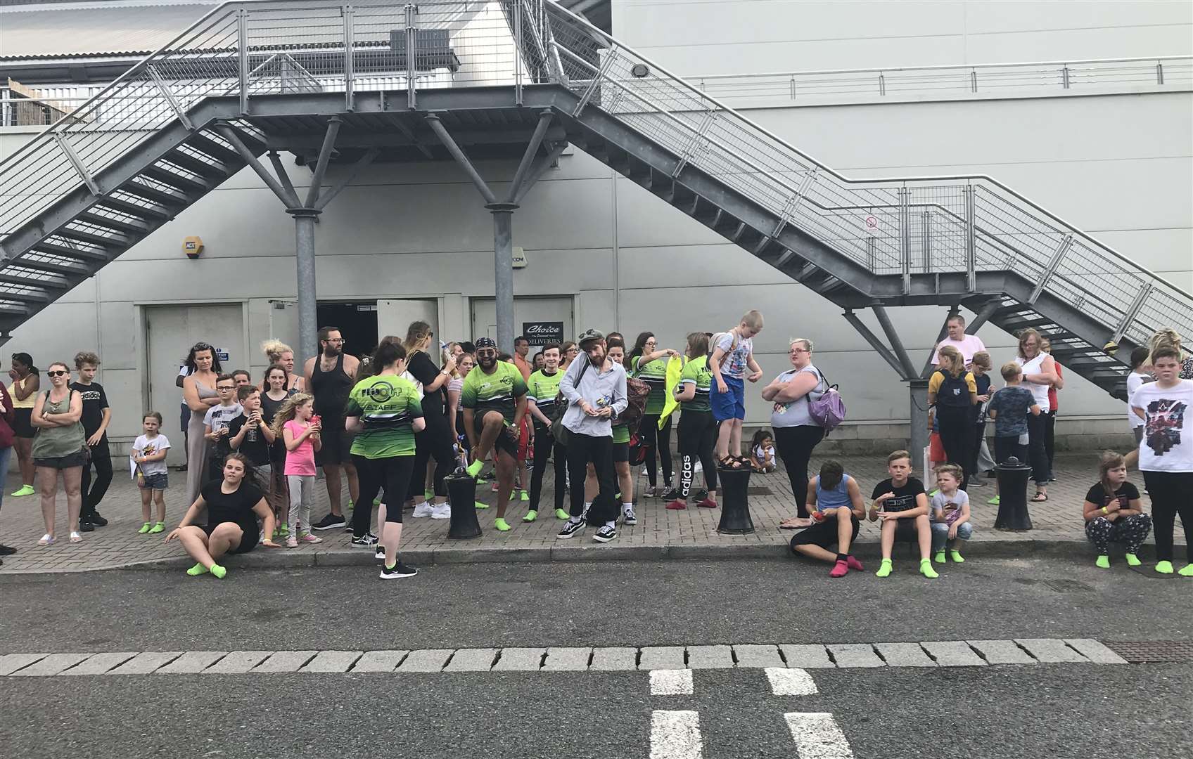 Shoppers and gym goers standing outside the Dockside Outlet after the power cut