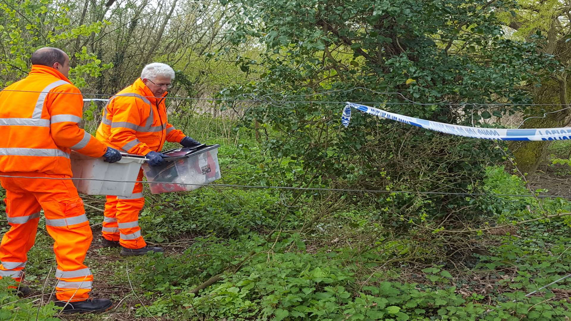 Serco workers clearing the site