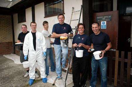 Sheppey fire station’s Green Watch – Dave Shaw, Ben Corello, Andy Bridger-Smart, Andy Friday, Sally Bliss and Steve Uggles – repaint DeLacey Hall