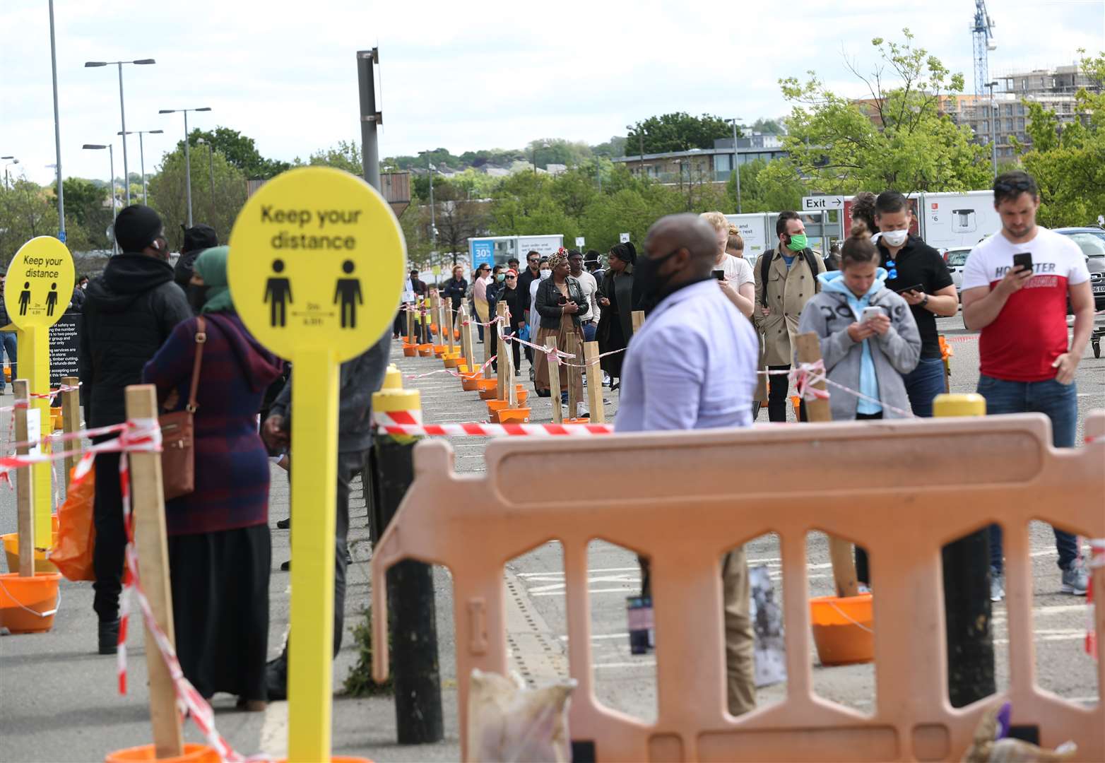 The queue outside the B&Q Greenwich store in London swelled early on Saturday (Yui Mok/PA)