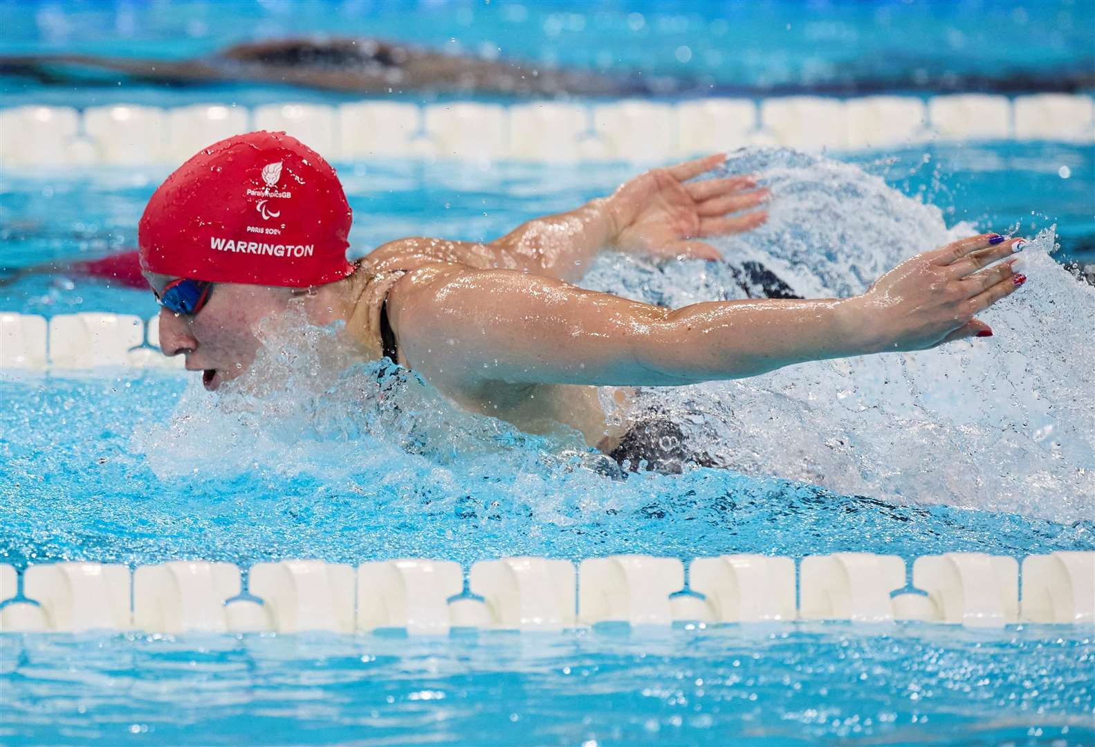 Callie-Ann Warrington on her way to silver in the 100m butterfly S10 final at the Paris Paralympics. Picture: imagecomms