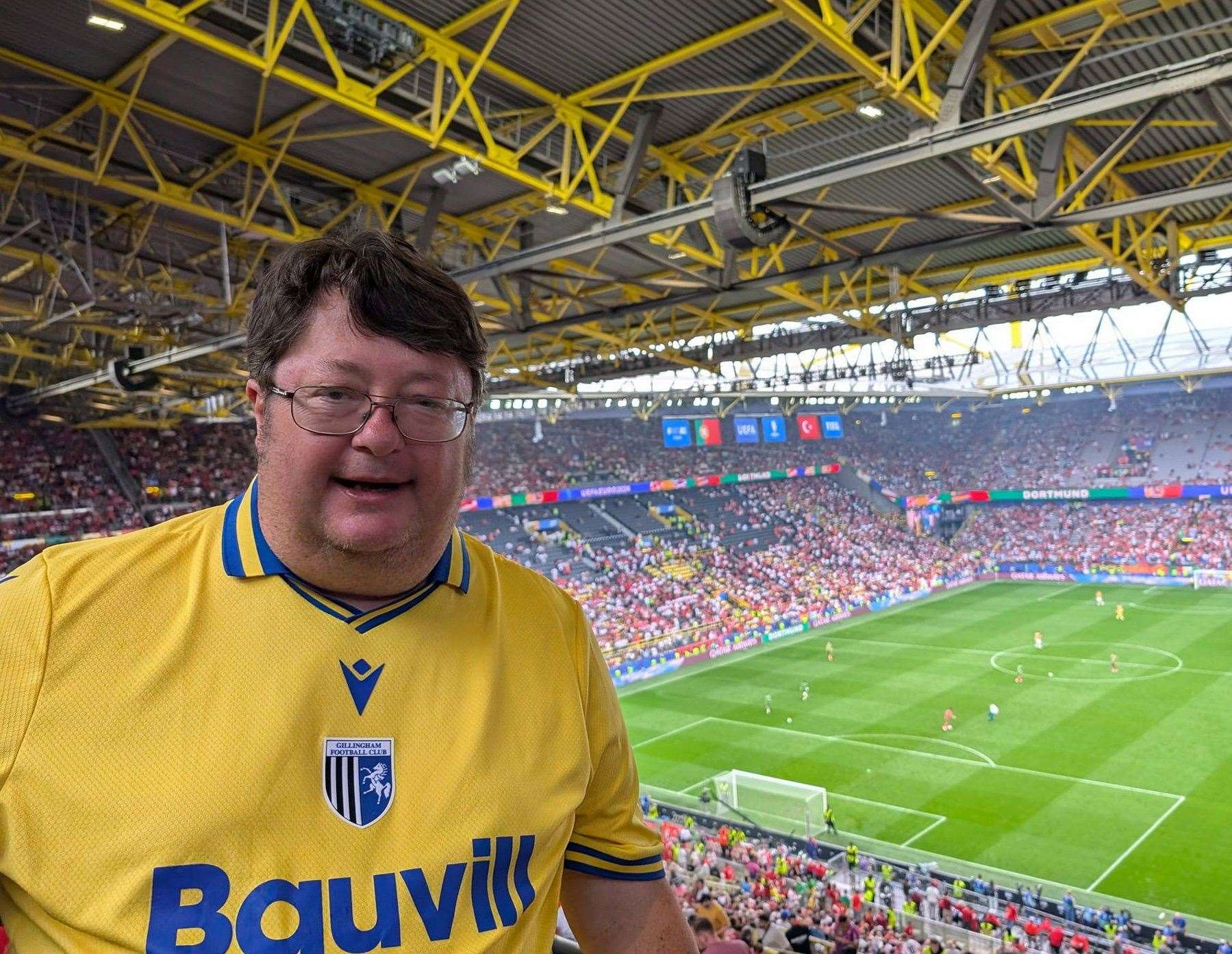 Eddie has made the most of Euro 2024 even seeing Turkiye vs Portugal in Dortmund while sporting his Gillingham shirt. Picture: SWNS