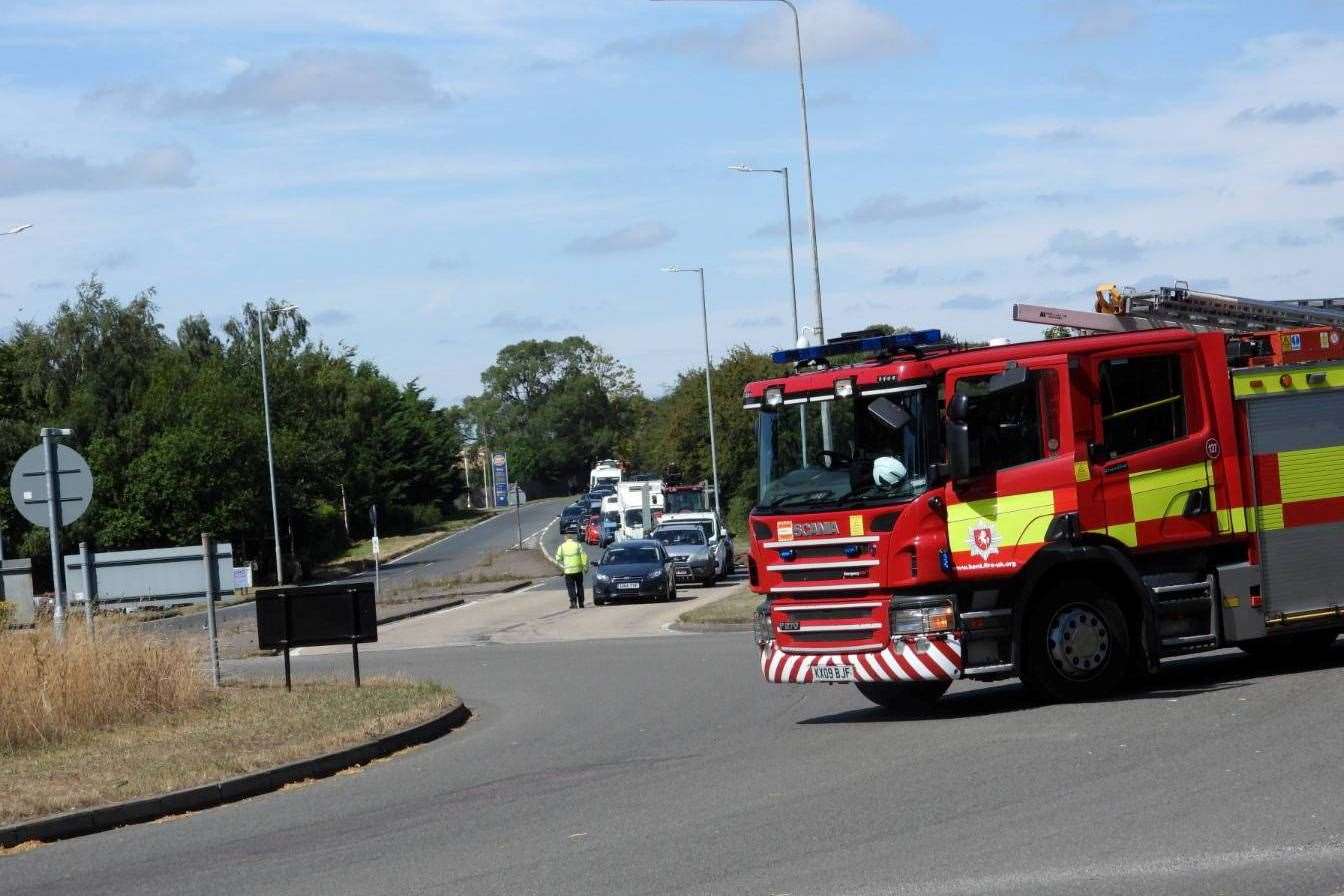 Fire crews were at the scene in Charing helping clear up the straw. Picture: Ale Pen