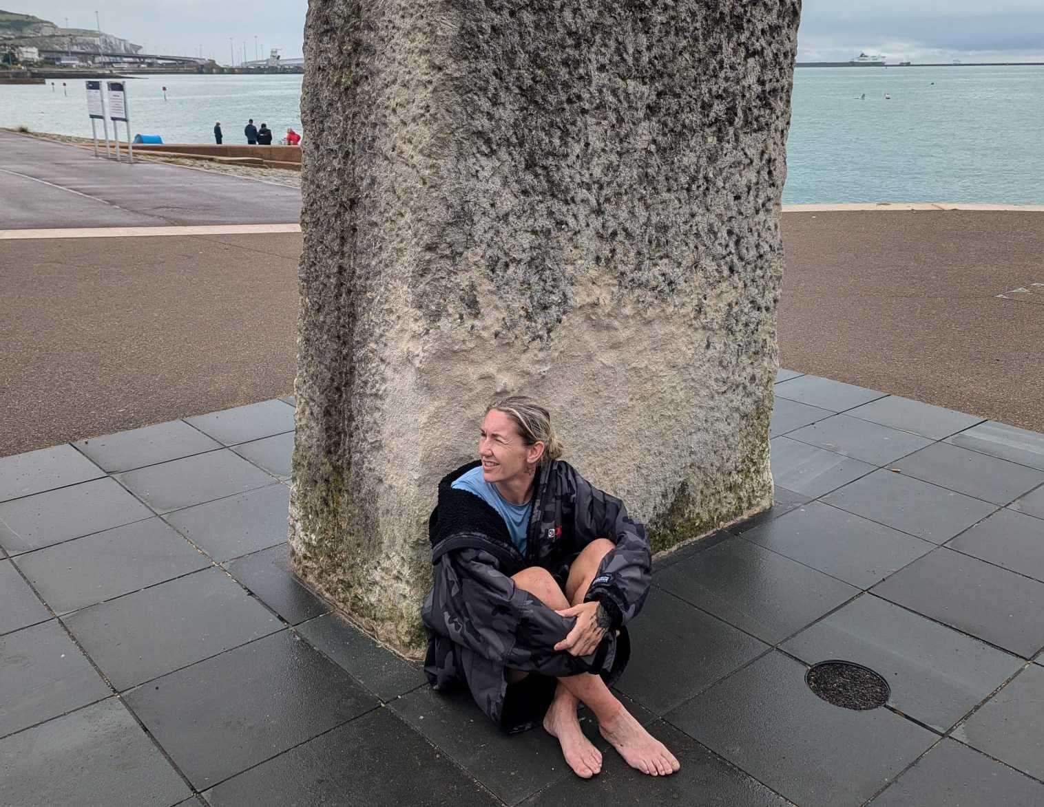 Carly Evans takes a rest after finishing her challenge in Dover