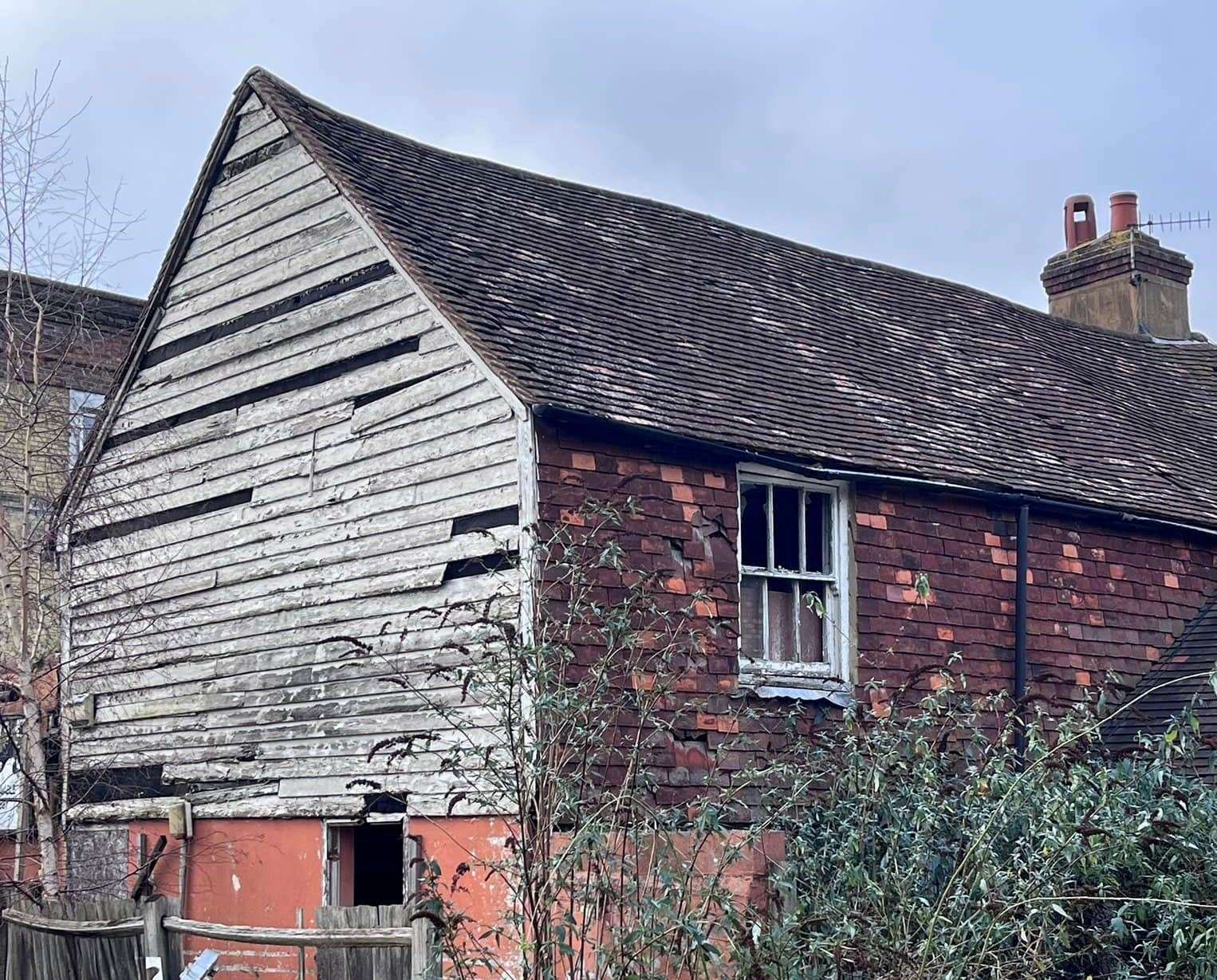 Holes and loose planks on the side of the Bat and Ball. Picture: Southborough Society