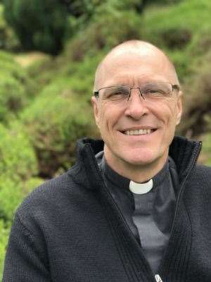 Father Robert Lane, priest of Borden parish church