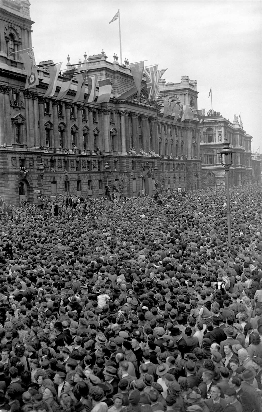 Huge crowds at Whitehall, London, on VE Day in 1945 (PA)