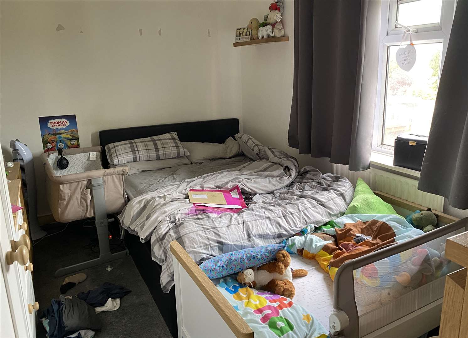 Cherina Turley and her young family are living out of one room at her parents' home in Gravesend while they wait to be rehoused Photo: Cherina Turley