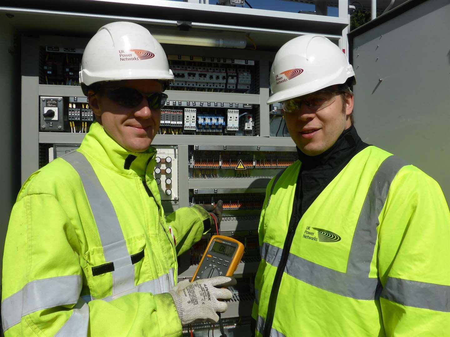 A new 42-tonne transformer is delivered to UK Power Networks’ substation in Maidstone as part of a £5.1m electricity upgrade. Project manager, Duncan Smith, withcommissioning engineer, Ed Spalding, by the transformer control cubicle. (10875817)