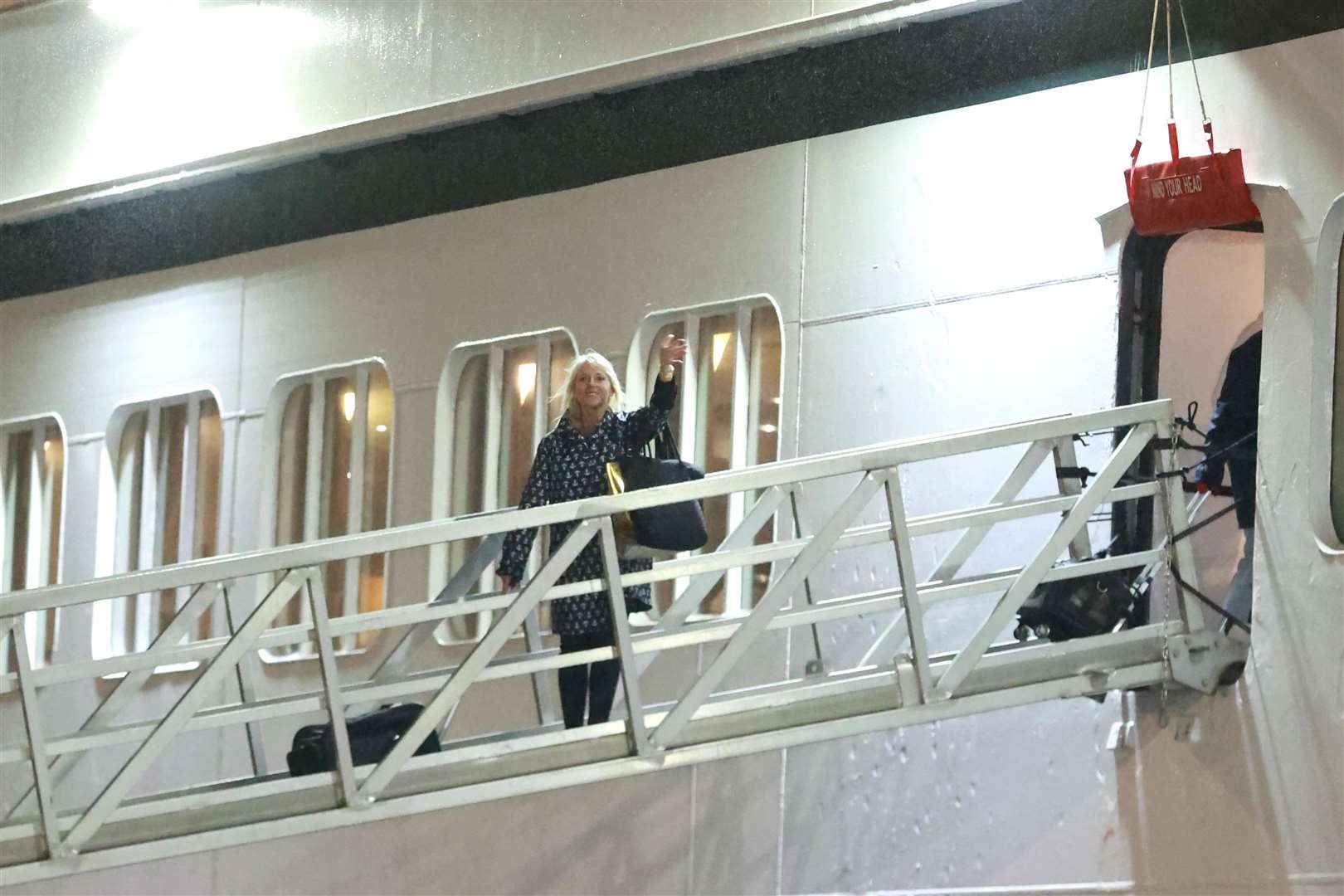 Holly Hennessey boards the Villa Vie Odyssey cruise ship at Belfast Port’s Cruise Ship Terminal (Liam McBurney/PA)