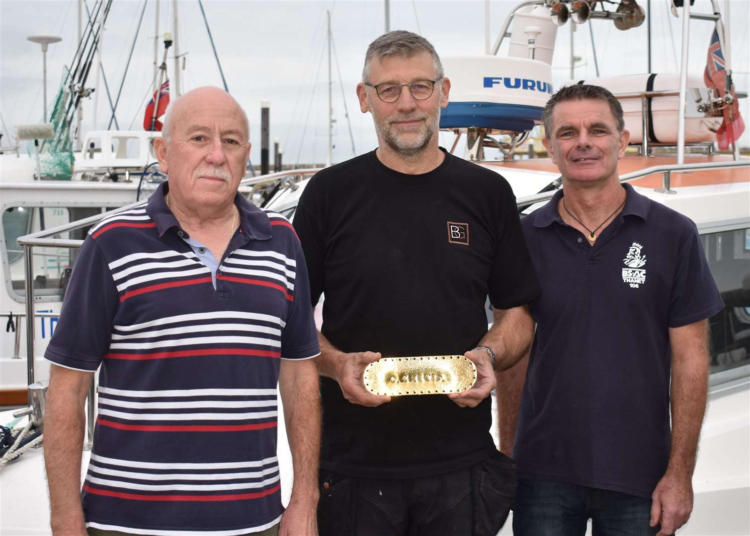 Chris Sandwell, Mick Terry and Mark Watson from Thanet Sub Aqua Club in Ramsgate with Charles Smith's nameplate. Picture: Mark Watson