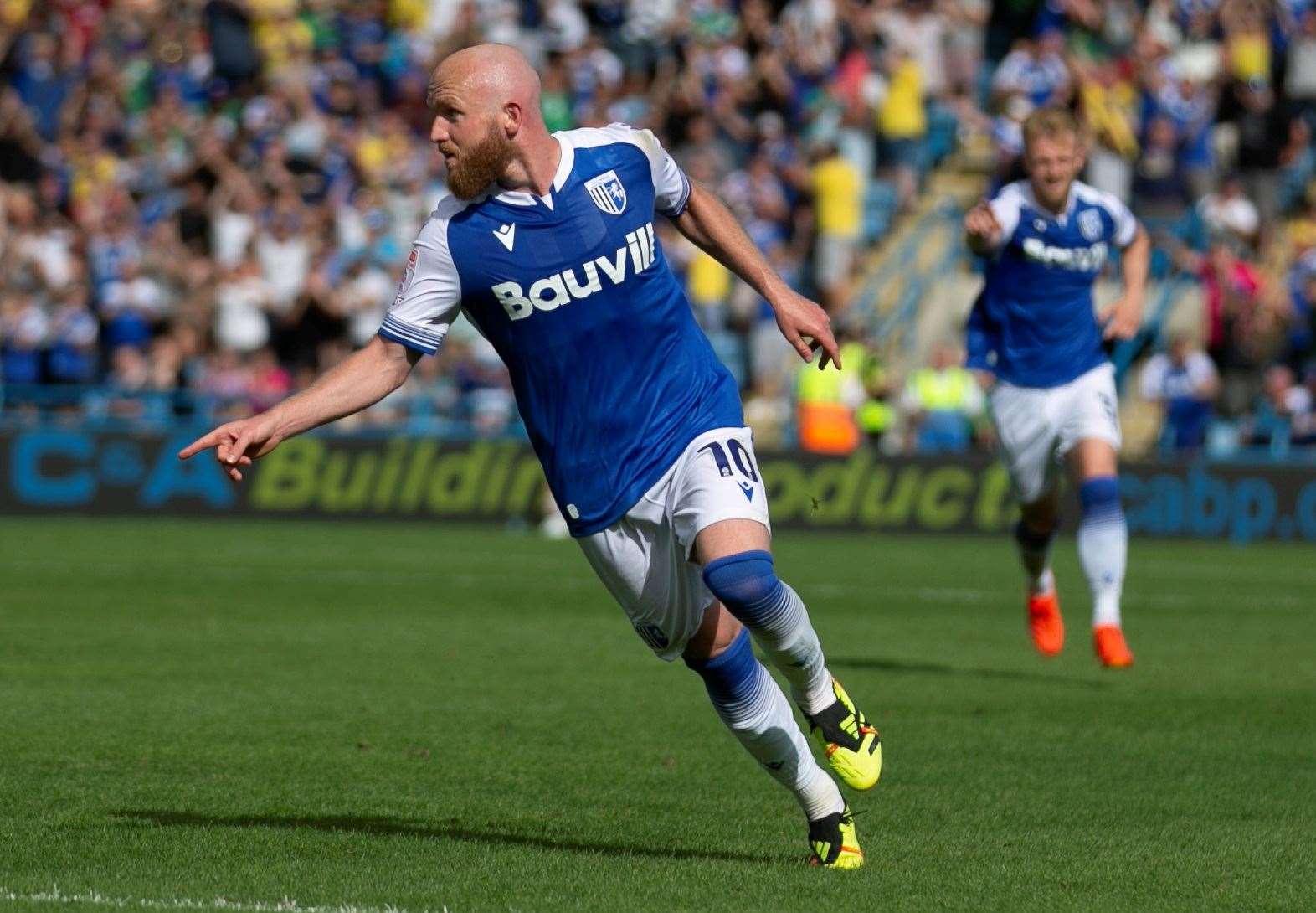 Jonny Williams wheels away after scoring for Gillingham against Carlisle last Saturday. Picture: @Julian_KPI