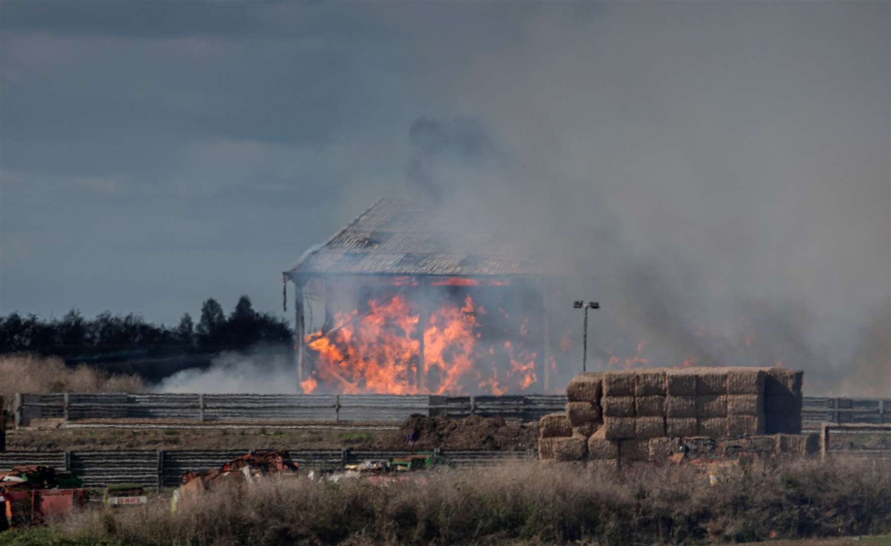 Fire crews continue to battle the barn blaze in Leysdown Road, Eastchurch, Sheppy for a second day. Picture: Rana Dias