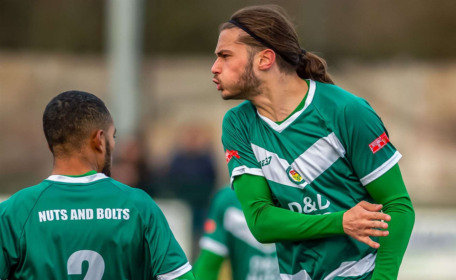 George Nikaj celebrates after scoring Ashford's goal. Picture: Ian Scammell