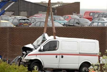 The van is removed from the scene. Picture: Terry Scott