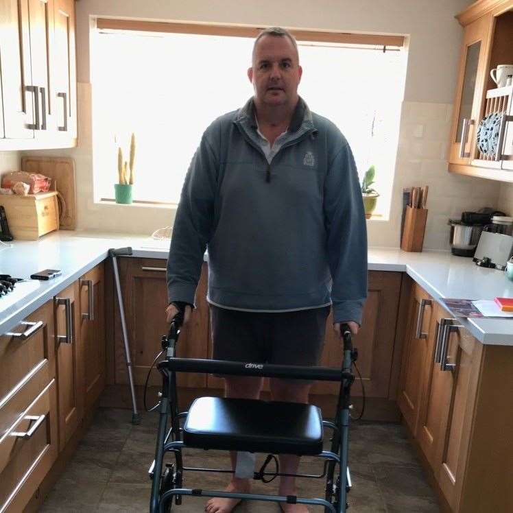 Richard learning to walk again, after being discharged from hospital. Picture: EKHUFT