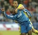 CLOSE ENCOUNTER: Jason Roberts battling with Gillingham's Chris Hope when the teams met last December. Picture: GRANT FALVEY