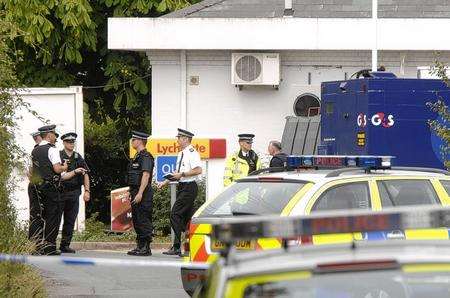 Police at the scene of the attempted armed robbery near Faversham