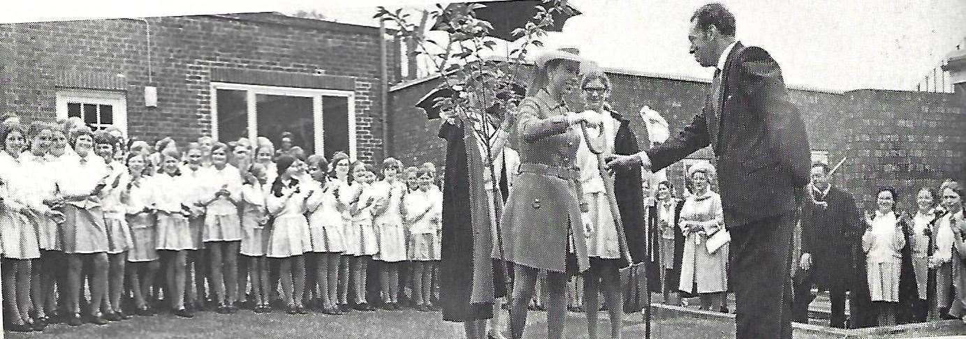 Princess Anne plants a cherry tree at Benenden School