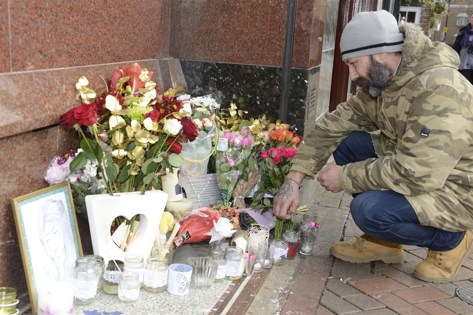 Martin Watt looks over a memorial to his partner Lisa Smith Picture: Paul Amos